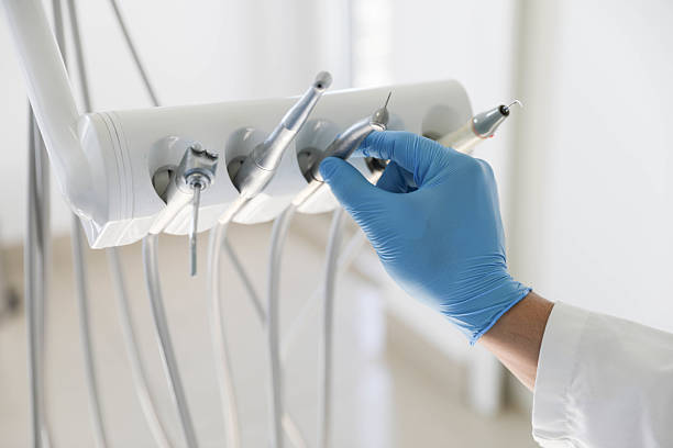 Professional Tooth Extraction technician working in Lincoln, IL